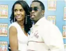  ??  ?? Sean P. Diddy Combs and his then-girlfriend Kim Porter