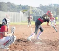  ??  ?? Junior Ashley Weingart bunts for Redwood during its softball game against San Rafael on Wednesday.