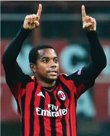  ?? — AFP file photo ?? Robinho celebrates after scoring during the Champion’s League match AC Milan vs FC Barcelona in San Siro Stadium in Milan.