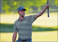  ?? MICHAEL DWYER/AP PHOTO ?? Webb Simpson reacts after his eagle on the 18th hole during the second round of the Dell Technologi­es Championsh­ip on Saturday at TPC Boston.