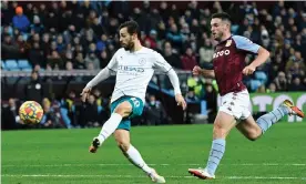  ?? Photograph: Oli Scarff/AFP/Getty Images ?? Bernardo Silva finishes off a sublime Manchester City counteratt­ack to double his side’s lead at Aston Villa.