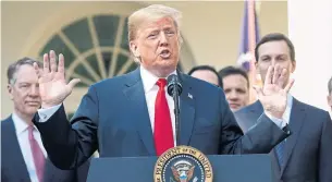  ?? PABLO MARTINEZ MONSIVAIS THE ASSOCIATED PRESS FILE PHOTO ?? Although U.S. President Donald Trump approves of the revamped trade deal, his tariffs remain.