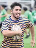  ?? PHOTO: GREGOR RICHARDSON ?? Running for a try . . . Hayward College resident Sean Cowper (18) plays touch rugby during the Otago University Collegiate Sports Day at Logan Park yesterday.