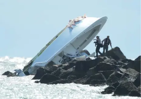  ?? JOE CAVERETTA/SUN SENTINEL/TNS ?? Early on Sunday morning, the Coast Guard discovered the wreckage of a boat Jose Fernandez and two friends had been riding in.