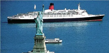  ??  ?? Giant on world stage: The QE2 crossed the Atlantic to New York hundreds of times