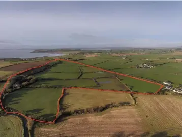  ??  ?? The residentia­l farm is located near Ardmore, Co Waterford, and has views over Whiting Bay; the land has 11 fields fenced with traditiona­l hedgerow and (left) the residence is elegant