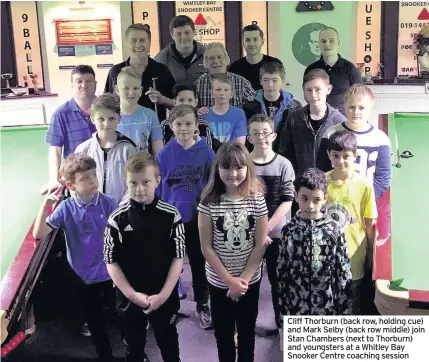  ??  ?? Cliff Thorburn (back row, holding cue) and Mark Selby (back row middle) join Stan Chambers (next to Thorburn) and youngsters at a Whitley Bay Snooker Centre coaching session