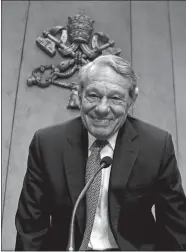  ?? GREGORIO BORGIA/AP FILE PHOTO ?? Former Pope John Paul II spokespers­on Joaquin NavarroVal­ls smiles prior to the start of a press conference on April 25, 2014, at the Vatican. He died Wednesday.