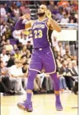  ?? AFP ?? LeBron James of the LA Lakers reacts after scoring against the Phoenix Suns on Wednesday.