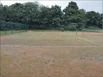  ?? ?? The rundown tennis court in Brodick.