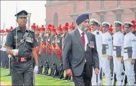 ?? PTI ?? Canadian defence minister Harjit Singh Sajjan inspecting a guard of honour in New Delhi.
