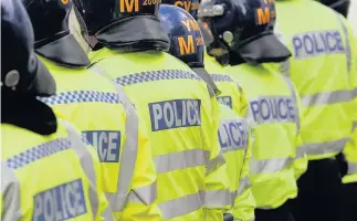  ??  ?? > The number of officers in West Midlands Police has fallen by 2,000 in seven years