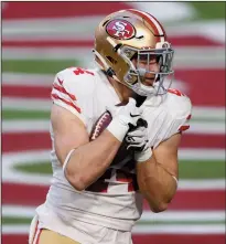  ?? CHRISTIAN PETERSEN/GETTY IMAGES ?? Fullback Kyle Juszczyk (44) of the 49ers catches a 1-yard touchdown against the Arizona Cardinals on Dec. 26, 2020 in Glendale, Ariz.