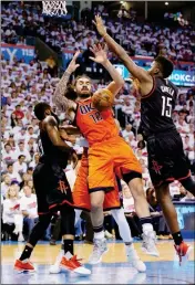  ?? ASSOCIATED PRESS ?? OKLAHOMA CITY THUNDER CENTER Steven Adams (12) loses the ball between Houston Rockets guard James Harden (13) and center Clint Capela (15) in the third quarter of Game 4 of a firstround NBA basketball playoff series in Oklahoma City on Sunday.