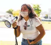  ?? ARIANA DREHSLER ?? Malia Daito gives an emotional speech on discrimina­tion in front of West Hills High School on Friday.