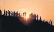  ?? AFP FILE ?? The nowhere people: Rohingya Muslim refugees walk down a hillside in the Kutupalong refugee camp in Cox's Bazar.