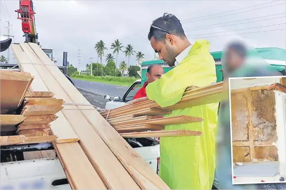  ?? Picture: SUPPLIED Picture: SUPPLIED ?? A Biosecurit­y Authority of Fiji staff member conducts an inspection with a vehicle loaded with timber to make sure they are AST-free.
Below: An AST damage on the inside of walls at an office building in Lautoka.