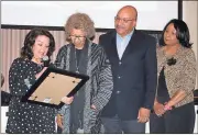  ?? Doug Walker / RN-T ?? City Commission­er Evie McNiece (from left) presents a proclamati­on honoring Delores Chatman. Chatman’s son Gary Chatman and Gail Veal participat­e in the ceremony.