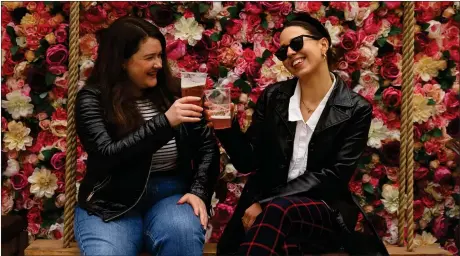  ?? Picture: Colin Mearns ?? Ellen Shand, left, and Laura Grant enjoy a pint in the outdoor roof garden at Malones Irish Bar on Sauchiehal­l Lane, Glasgow, as shops, cafes, pubs, hospitalit­y venues, gyms and museums across Scotland reopened today as lockdown restrictio­ns were eased