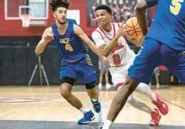  ?? WILLIE J. ALLEN JR./ORLANDO SENTINEL ?? Orlando Christian Prep guard Ameer Ramadan, left, defends against Erik Taylor, of Edgewater, during a regular-season game. OCP looks to win its fourth consecutiv­e Class 2A boys basketball championsh­ip this week in Lakeland.