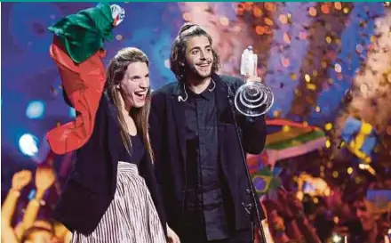  ?? EPA PIC ?? Salvador Sobral from Portugal celebrates with his sister, Luísa, after he wins the Eurovision Song Contest in Kiev on Saturday.