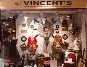  ??  ?? Vincent’s shops are closed. Below, Michael Grogan