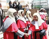  ?? ?? Deputy Chief Justice Elizabeth Gwaunza (right) greets Bulawayo High Court Judges on her arrival for the official opening of 2024 Legal Year, yesterday.— Pictures: Eliah Saushoma