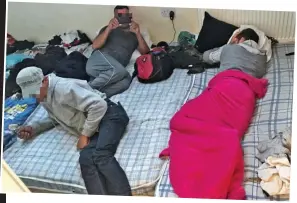  ??  ?? Crammed in: Filthy mattresses for 35 men in a three-bedroom semi