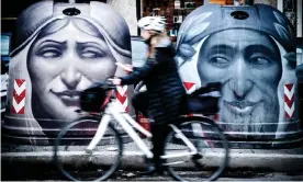  ?? Photograph: Tiziana Fabi/AFP/Getty Images ?? Journeying from Hell to Paradise … two glass recycling containers painted in tribute to Dante and The Divine Comedy as part of the Urban Galleries of the Ideal City in Rome.