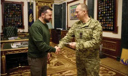  ?? ?? Ukraine's president Volodymyr Zelenskiy and commander in chief of the Ukrainian armed forces Col Gen Oleksandr Syrskyi after a meeting with newly appointed top military commanders. Photograph: Ukrainian Presidenti­al Press Service/Reuters