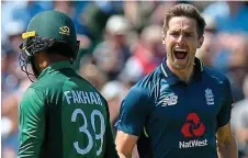  ??  ?? On song: Woakes, who finished with 4-67, removes Fakhar for two PRO SPORTS/REX