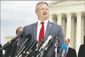  ?? MANUEL BALCE CENETA/AP ?? South Dakota Attorney General Jason Ravnsborg, joined by a bipartisan group of state attorneys general, speaks to reporters in front of the U.S. Supreme Court in Washington on Sept. 9, 2019.