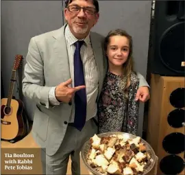  ??  ?? Tia Boulton with Rabbi Pete Tobias