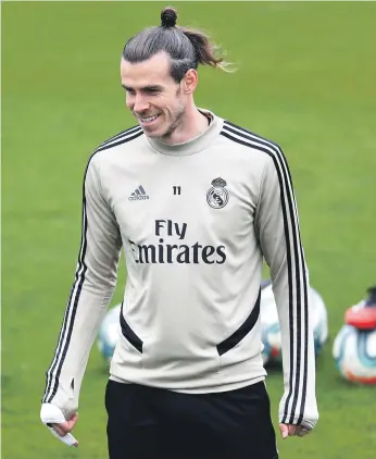  ?? Reuters ?? Welsh attacker Gareth Bale, right, pictured training with Real Madrid ahead of today’s crucial match against Barcelona, has managed just two goals in La Liga this season