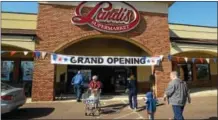  ?? PETE BANNANDIGI­TAL FIRST MEDIA ?? Crowds of people came out Tuesday March 1st for the opening of the Landis Supermarke­t at Sanatoga Shopping Center in Lower Pottsgrove.