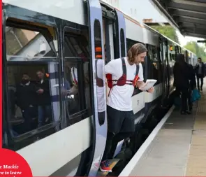  ??  ?? RW’S Joe Mackie reads ‘How to leave a train’ instructio­ns before the first leg; the plaque marking Section 14