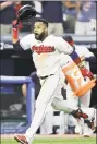  ?? Tony Dejak / Associated Press ?? The Indians’ Carlos Santana celebrates after hitting a solo home run in the ninth inning against the Red Sox on Monday in Cleveland.