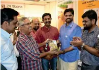  ?? Supplied photo ?? Harilal Rajendran with Binoy Vishwam during the release of his book at the Sharjah book fair. —