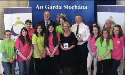  ??  ?? Retired District court Judge Michael Pattwell pictured with Chief Superinten­dent Tom Hayes at the launch of a booklet to help young people understand the law.