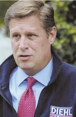  ?? STAFF PHOTOS BY NICOLAUS CZARNECKI ?? SPLIT: Geoff Diehl, above, speaks to the media outside a campaign event yesterday in Hingham. Diehl supports Judge Brett Kavanaugh but Gov. Charlie Baker, above left, has been mum.