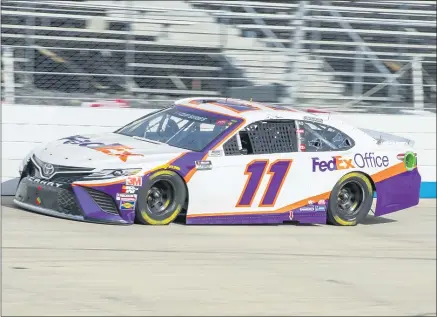  ?? JASON MINTO — THE ASSOCIATED PRESS ?? Denny Hamlin (11) leads during Saturday’s NASCAR race at Dover Internatio­nal Speedway.