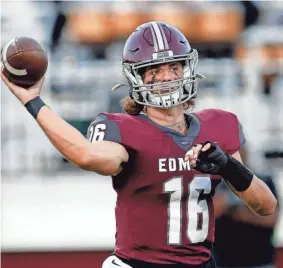  ?? Edmond Memorial’s David McComb throws a pass during the high school football game against Edmond Santa Fe at Edmond Memorial High School in Edmond on Sept. 23. SARAH PHIPPS/THE OKLAHOMAN ??