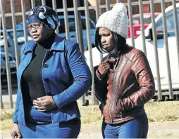  ?? / VELI NHLAPO ?? Nesta Yende, left, Thembisile Yende’s mother, outside Springs Magistrate’s Court yesterday.