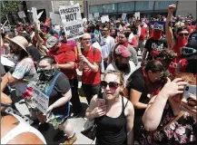  ?? BILL LACKEY/STAFF ?? Hundreds of protesters rallied together against a KKK-affiliated group last May along Main Street in Dayton.