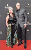  ?? PAUL ABELL/INVISION/AP ?? Former Cardinals quarterbac­k Kurt Warner and wife Brenda Warner are co-producers of a movie depicting his life story.