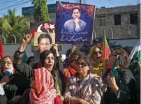  ?? — AFP ?? Supporters of former prime minister Imran Khan’s Pakistan Tehreeke-insaf party protest against the alleged skewing in Pakistan’s national election results in Karachi on Saturday.