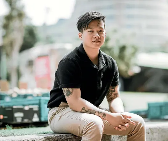  ?? ROSA WOODS/STUFF ?? Terry Ang, from Malaysia, is in his final year of a law degree at Victoria University. He says making it back to New Zealand was like winning a golden ticket . . . but that was not the case for his family back home.