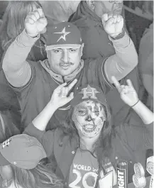  ?? Yi-Chin Lee / Houston Chronicle ?? Fans’ support for the Astros was plainly written on their faces.