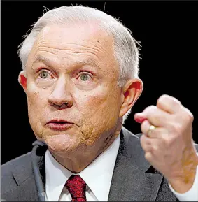  ?? AP/JACQUELYN MARTIN ?? “I recused myself from any investigat­ion into the campaign for president,” Attorney General Jeff Sessions said Tuesday. “I did not recuse myself from defending my honor against scurrilous and false allegation­s.”