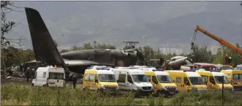  ?? AP PHOTO/ANIS BELGHOUL ?? Firefighte­rs and civil security officers work at the scene of a fatal military plane crash in Boufarik, near the Algerian capital, Algiers on Wednesday. Algerian emergency services say 181 people have been killed in a military plane crash and some...